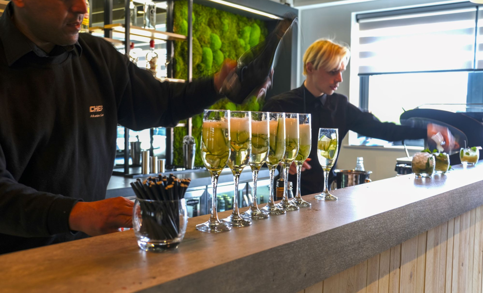 bar staff serving drinks at the loft bar