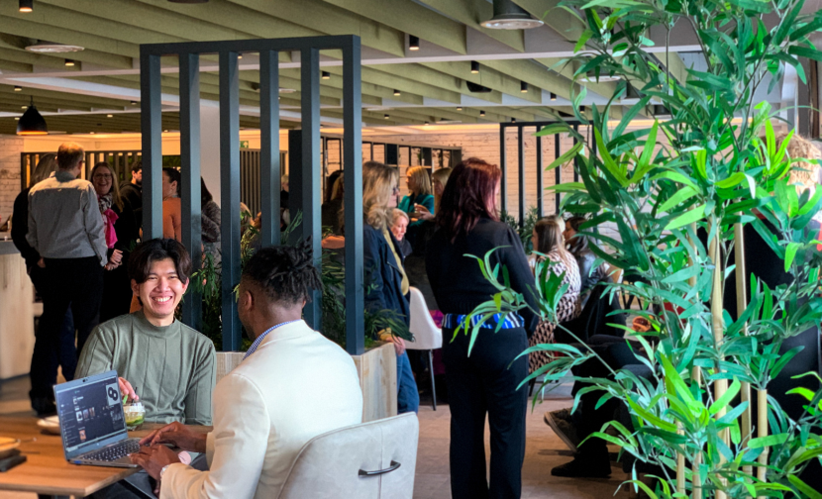 people networking in the loft bar at cranmore park